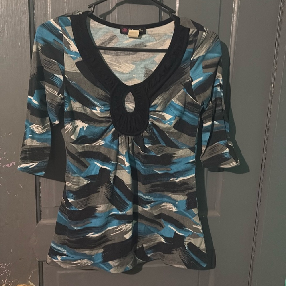Shirt, sleeves cut off at the elbow